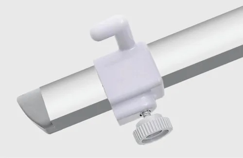 This is a close-up of a white clamp attached to a banner pole, likely a part of display equipment for hanging signs or flags.