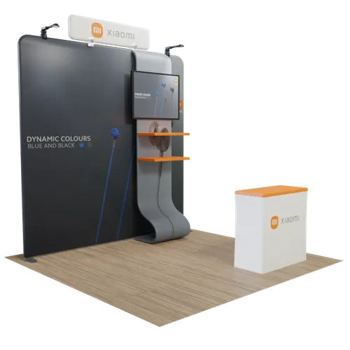 This is a promotional trade show booth with various display elements, including banners and a counter, featuring the Xiaomi brand.